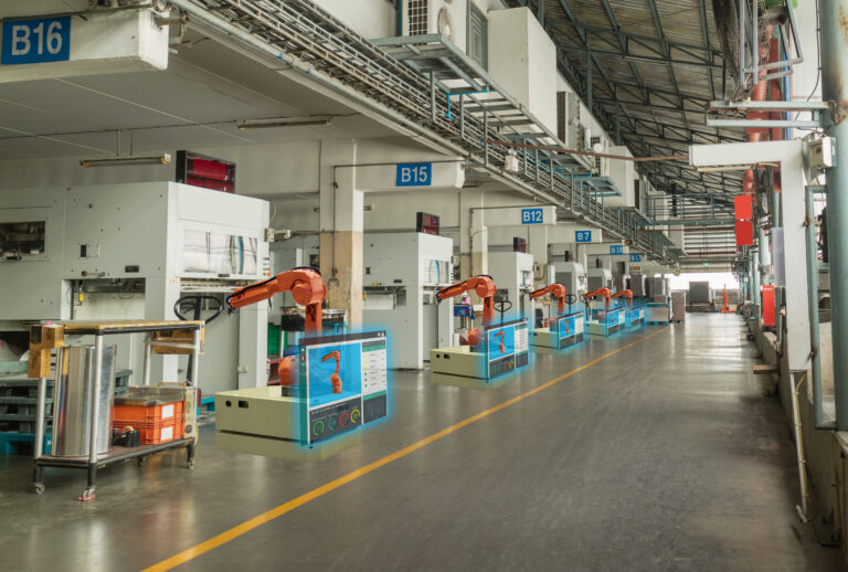 Image of industrial robots in a production line